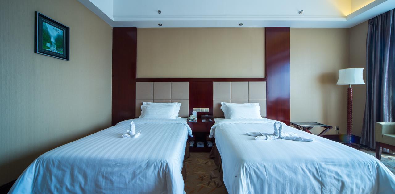 Da Cheng Shan Shui Hotel Чжанцзяцзе Номер фото